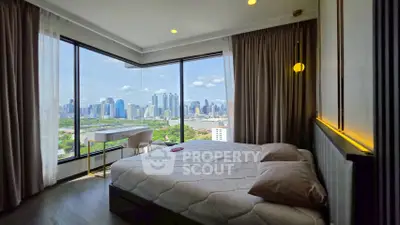 Luxurious bedroom with panoramic city view and modern decor