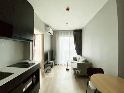 Modern living room with sleek furniture and natural light