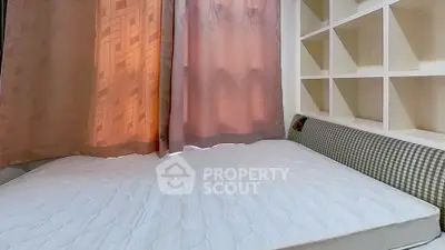 Cozy bedroom with soft lighting and built-in shelving