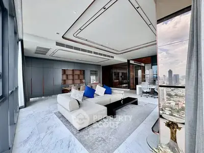Luxurious modern living room with panoramic city view and elegant furnishings.
