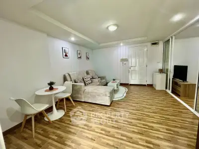 Spacious modern living room with stylish decor and cozy seating area
