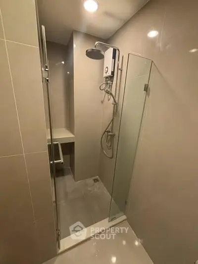 Modern bathroom with sleek shower design and contemporary fixtures