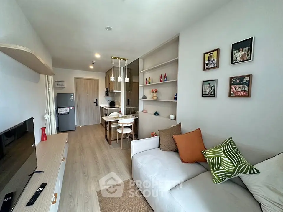 Modern living room with stylish decor and open kitchen layout