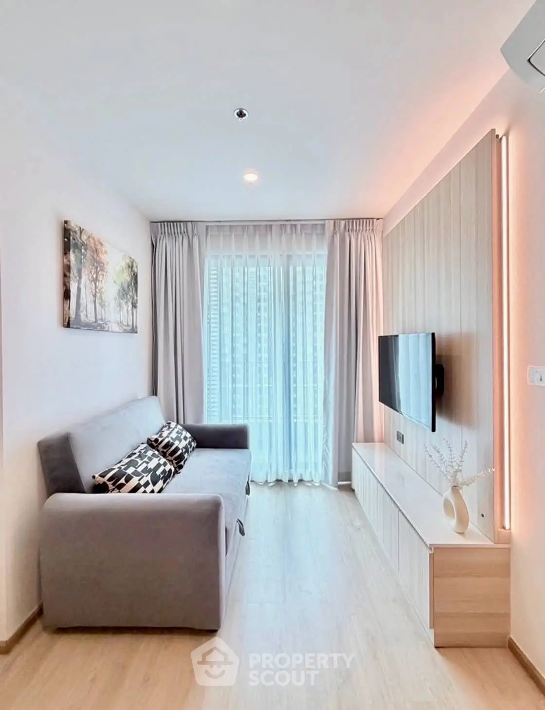 Modern living room with sleek design and natural light