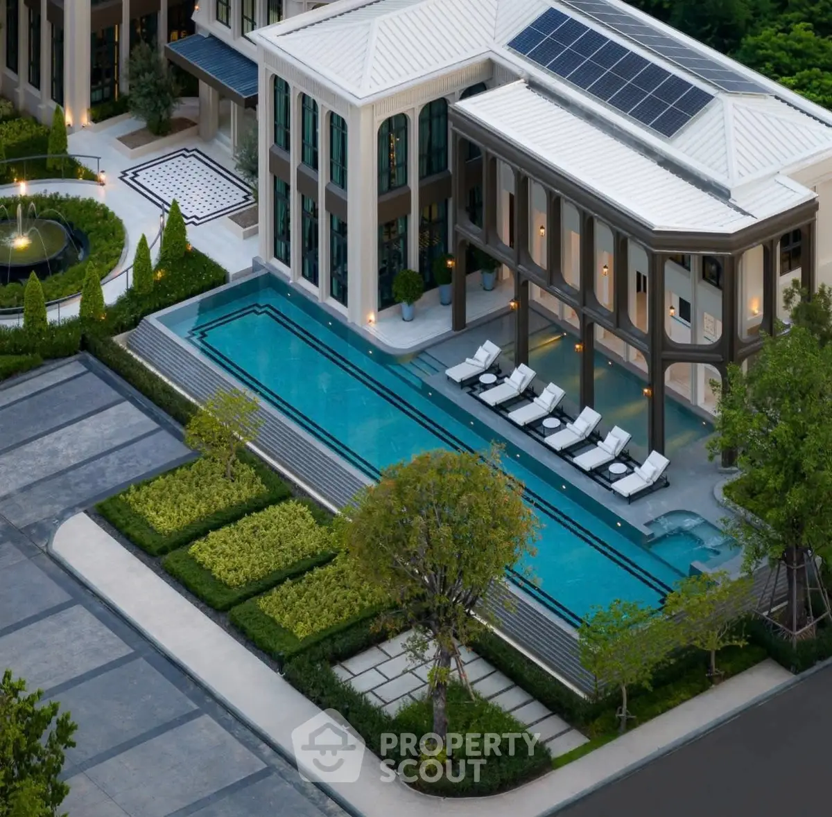 Luxurious modern villa with private pool and lush garden, showcasing elegant architecture and serene surroundings.