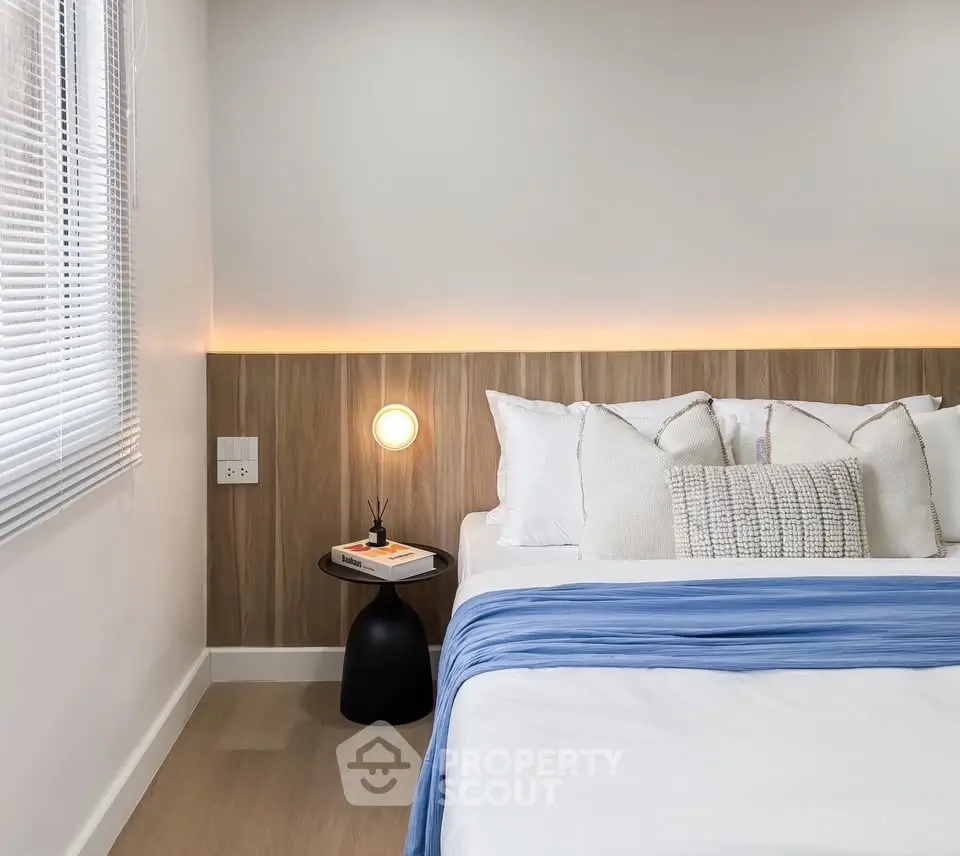 Modern bedroom with stylish decor and cozy ambiance