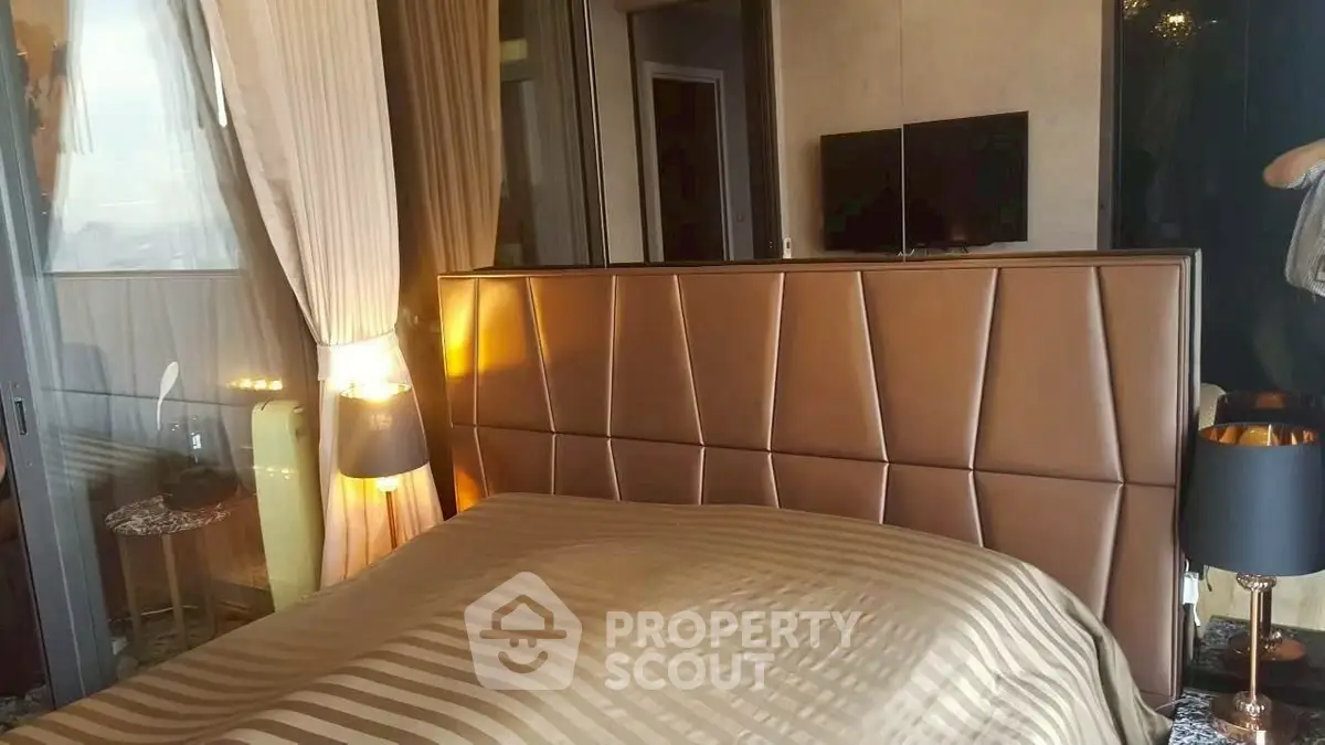 Luxurious bedroom with elegant decor and modern lighting