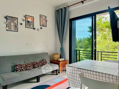Charming living room with modern decor and balcony view, perfect for relaxation and entertaining.