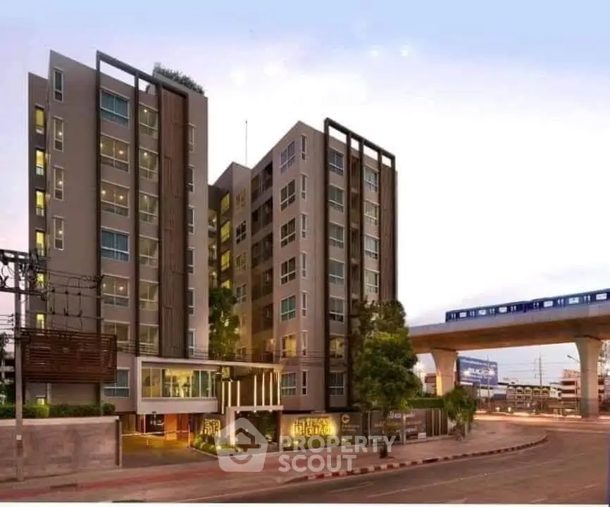 Modern urban apartment building with sleek design near public transit