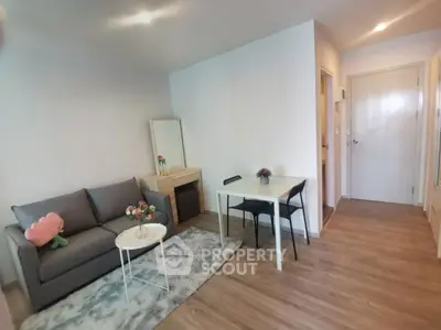 Modern living room with cozy sofa and dining area in stylish apartment