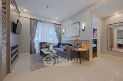 Elegant living room with modern decor and natural light in a luxury apartment.