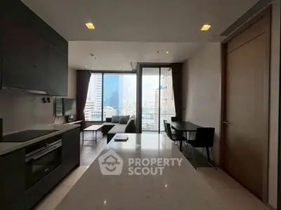 Modern living room with city view and sleek kitchen design