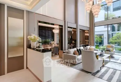 Luxurious modern living room with high ceilings and elegant decor