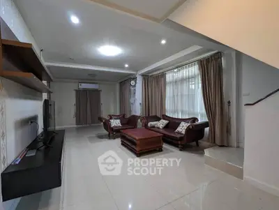 Spacious living room with elegant furniture and natural light