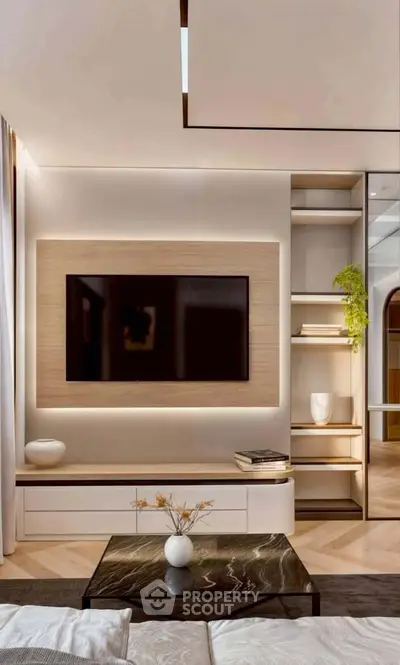 Modern living room with sleek TV setup and stylish decor