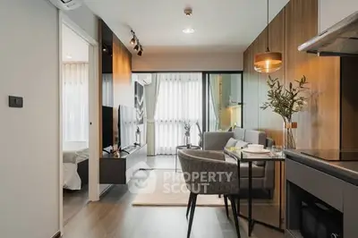 Modern open-plan living room with elegant dining area and stylish decor