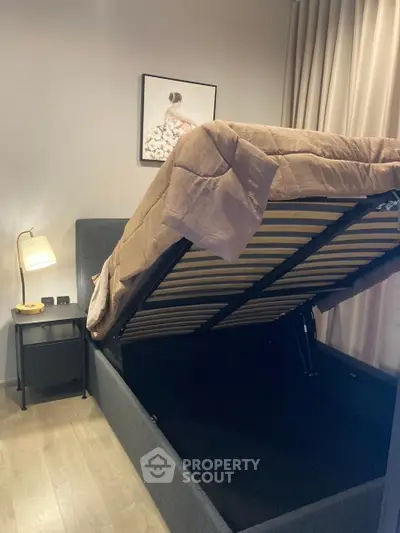 Modern bedroom with storage bed and stylish decor