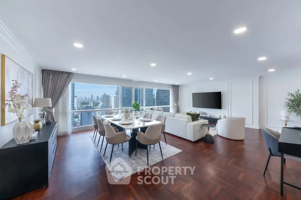 Luxurious open-plan living room with stunning city view and elegant decor