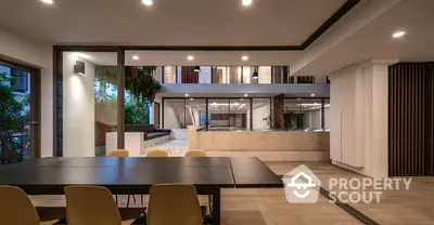 Luxurious modern dining area with open layout and elegant lighting