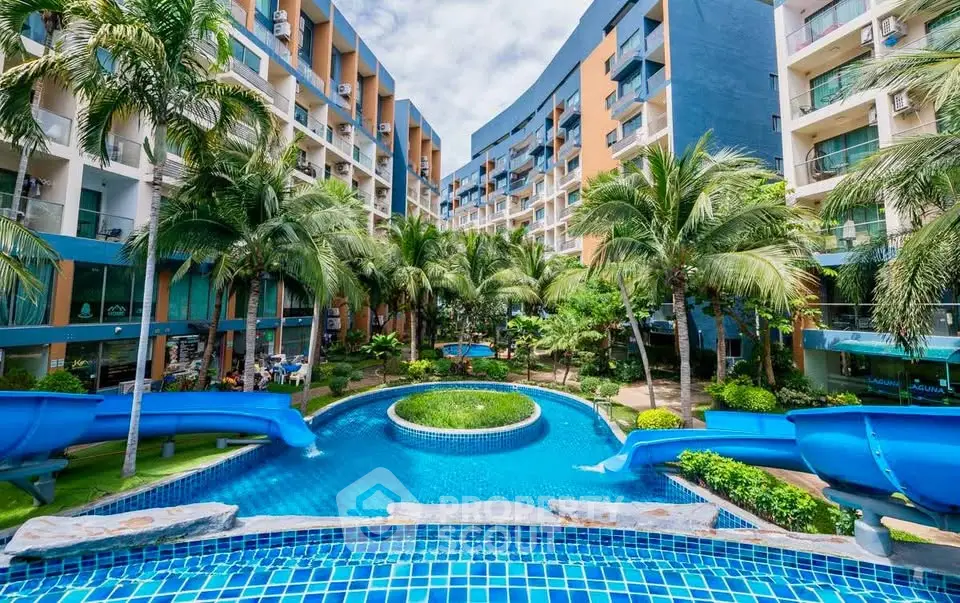 Luxurious condominium with stunning pool and lush garden view