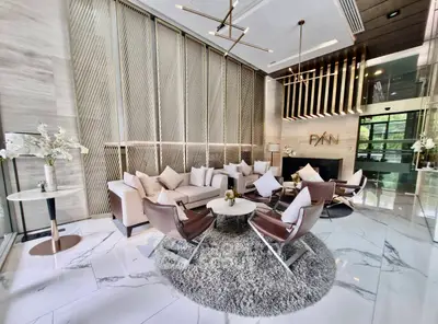 Luxurious modern living room with elegant furniture and stylish decor in a high-end apartment.