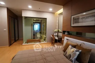 Modern bedroom with ensuite bathroom and stylish decor