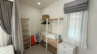 Spacious bedroom with modern open closet and natural light