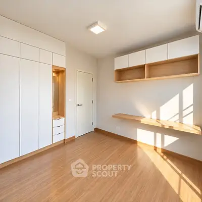 Spacious modern study room with built-in storage and natural light