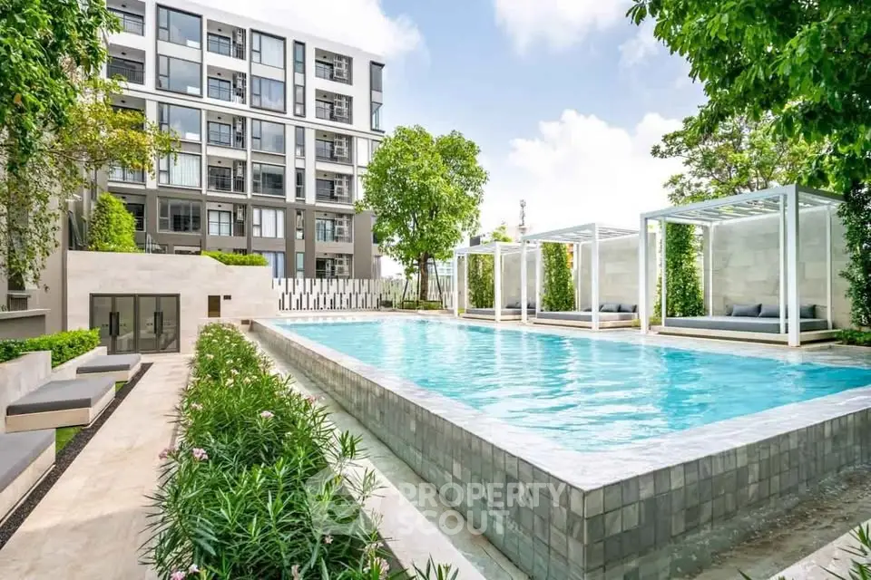 Luxurious condominium with stunning pool and modern architecture