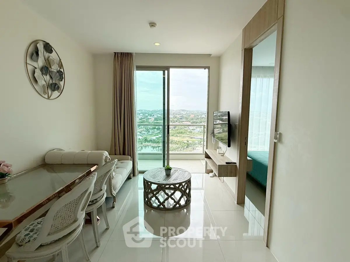 Modern living room with stunning view and elegant decor in high-rise apartment