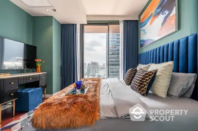 Luxurious bedroom with city view, modern decor, and plush bedding in high-rise apartment.