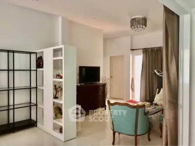 Spacious living room with elegant decor and natural light