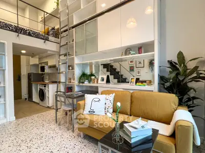Modern loft apartment with stylish living room and mezzanine, featuring chic decor and open layout.