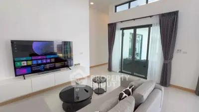 Modern living room with sleek TV setup and stylish decor