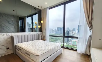 Luxurious bedroom with stunning city view and elegant decor