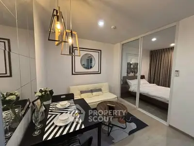 Modern studio apartment with stylish decor and cozy bedroom