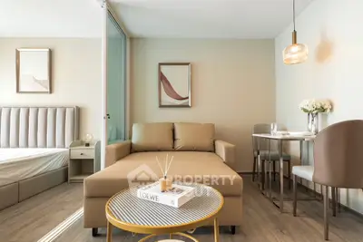 Modern living room with stylish decor and cozy seating in a contemporary apartment.