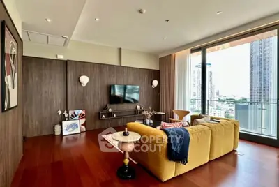 Spacious modern living room with city view and stylish decor
