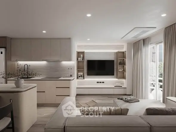 Modern open-layout living room with sleek kitchen and cozy seating area, perfect for contemporary living.
