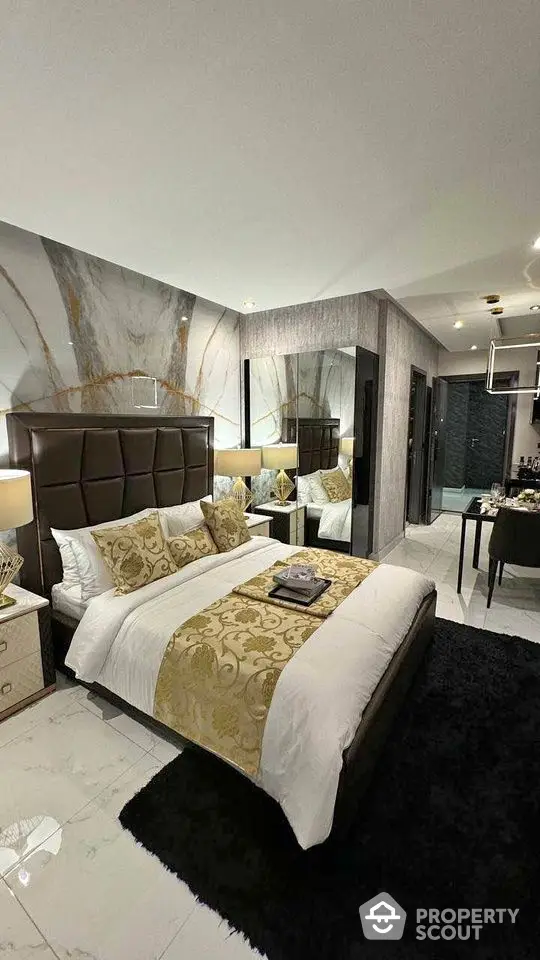 Luxurious modern bedroom with elegant decor and plush bedding