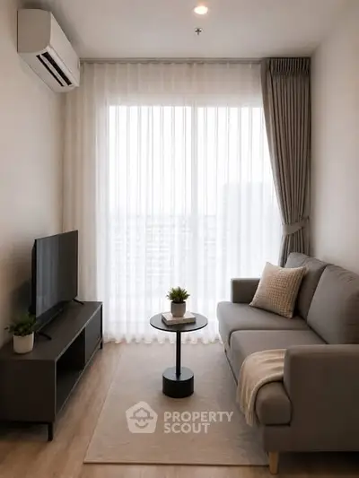 Cozy living room with modern sofa, TV, and large window with sheer curtains.