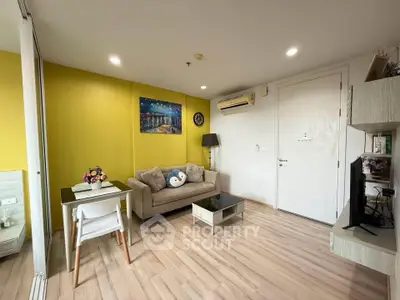 Charming living room with modern decor, cozy sofa, and vibrant yellow accent wall, perfect for relaxation.