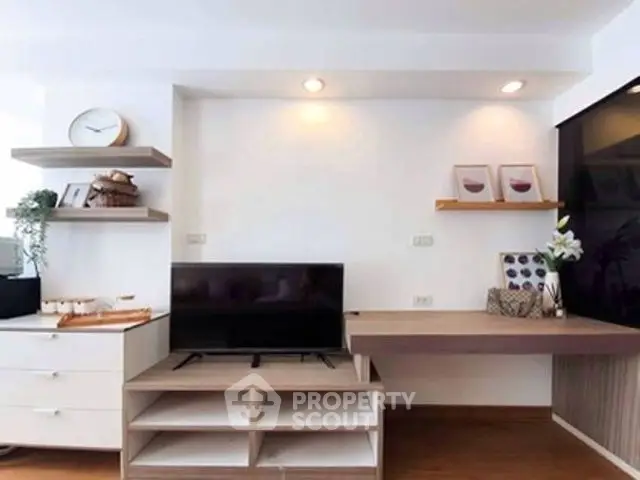 Modern living room with sleek TV setup and stylish decor