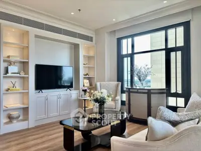 Luxurious living room with elegant decor and large windows offering stunning views.