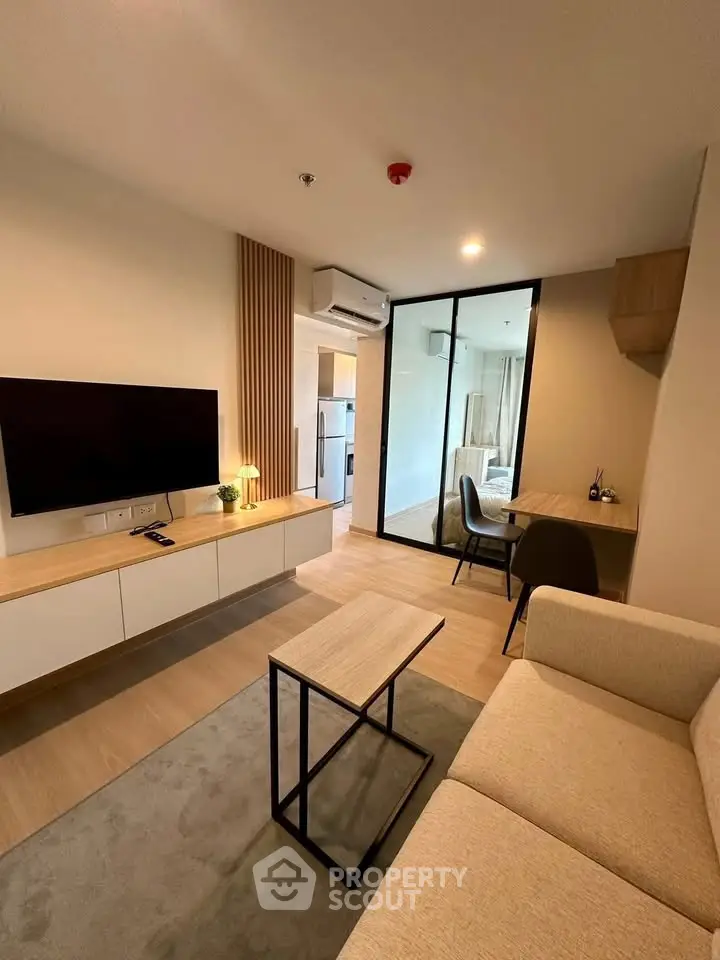 Modern living room with stylish furniture and open layout in a contemporary apartment.