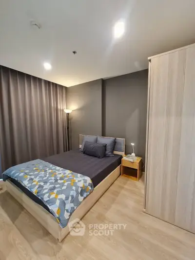 Modern bedroom with stylish decor and cozy ambiance