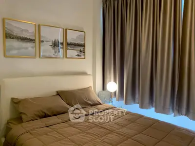 Cozy bedroom with elegant decor and warm lighting, perfect for relaxation.