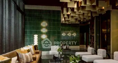 Luxurious modern living room with unique ceiling design and stylish furniture.