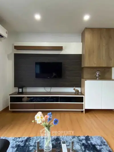 Modern living room with sleek TV unit and stylish decor
