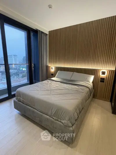 Luxurious modern bedroom with floor-to-ceiling windows and elegant wood paneling.